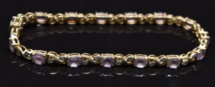 A 9ct gold bracelet set with amethyst and diamonds, 7g