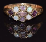A 15ct gold ring set with opals and amethysts, Birmingham 1873, size L, 1.4g