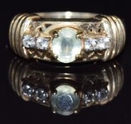 A 9k gold ring set with quartz and topaz, size N, 4.4g