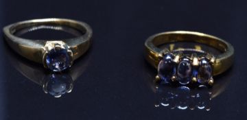 Two 9ct gold rings set with tanzanites, size M, 7.4g