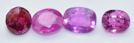 Four loose oval and cushion cut natural unheated Burmese rubies, total carat weight approximately