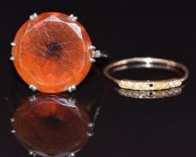 A 14k gold ring set with a faux citrine and diamond shoulders and a 14k gold ring, size L and I/J,