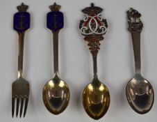 Three Danish silver spoons and a fork, two with blue enamel anchor topped by a crown, another with