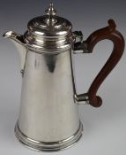 Elizabeth II hallmarked silver hot water jug of plain tapering form, London 1962, maker C J Vander