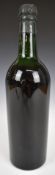 A vintage anonymous bottle of wine or Port with Berry Brothers, London seal and raised letter G to