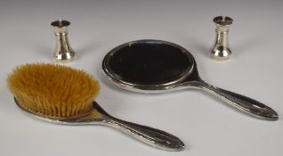 Pair of hallmarked silver peppers, weight 44g together with a hallmarked silver mounted bush and