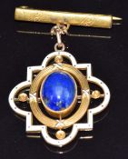 Victorian 9ct gold brooch set with a lapis lazuli cabochon and white enamel