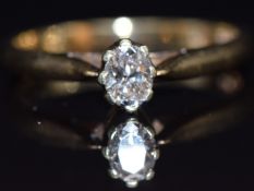 A 9ct gold ring set with an oval cut diamond of approximately 0.2ct, size M, 2.3g