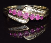 A 9ct gold ring set with rubies and diamonds, size M, 2.4g