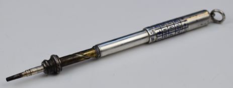 A white metal propelling pencil with inlaid enamel calendar