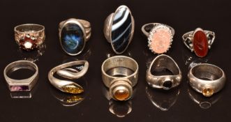 Ten silver rings set with opal and garnets, quartz, labadorite, pressed amber, tiger's eye, agate,