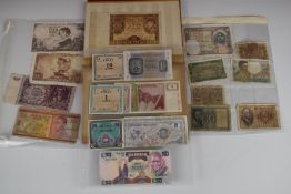 A collection of overseas banknotes in an album and sleeves, to include 1970 Congo Republic 50