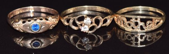 A 9ct rose gold ring set with paste, Chester 1919, and two 9ct gold rings, 3.6g