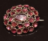 Victorian silver brooch set with foiled garnets