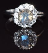 A 9k gold ring set with labradorite and topaz, size N, 3.1g