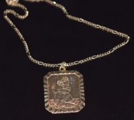 A 9ct gold St. Christopher on a 9ct gold chain, 2.7g