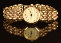 Accurist 9ct gold ladies wristwatch with gold hands and hour markers, champagne dial and quartz