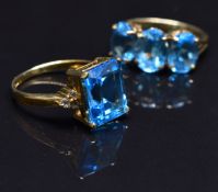 Two 9ct gold rings set with blue topaz, size N, 7.5g