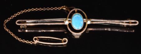 A 9ct gold brooch set with an opal doublet and seed pearls, 2.9g