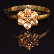A 9k gold ring set with spessarite garnet, size M, 2g
