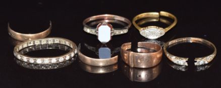 An 18ct gold ring set with diamonds (1.6g) and 9ct gold sections of rings, 5.1g