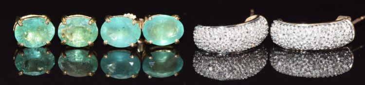 Three pairs of 9ct gold earrings, two pairs set with emeralds and the other with diamonds, 5.1g