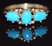 A 9ct gold ring set with faux turquoise, size P, 2g