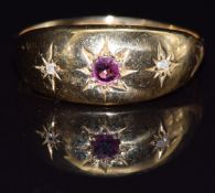 An 18ct gold ring set with rubies and diamonds, Chester 1913, size K, 2.3g