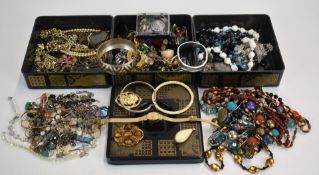 A collection of costume jewellery including vintage necklaces, Victorian locket, brooches, etc