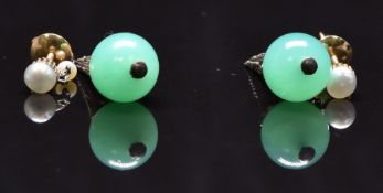 A pair of earrings set with seed pearls, pearls and an agate bead to each