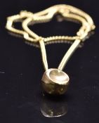 A 9ct gold shell pendant on 9ct gold chain, 6.1g