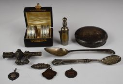 Cased pair of hallmarked silver napkin rings, hallmarked silver dressing table pot lid, hallmarked