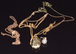 A 9ct gold locket, 9ct gold pendant set with cubic zirconia and two 9ct gold chains, 5.1g