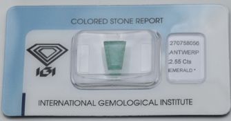 A loose 2.55ct tapered baguette cut emerald with certificate