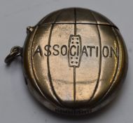 Brass vesta in the form of a football or rugby ball with impressed 'Association' to front,