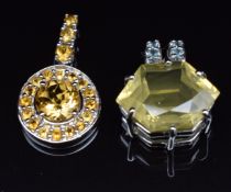 A 9k white gold pendant set with citrine and Alexandrite and a 9k white gold pendant set with