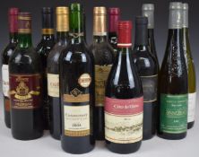 Thirteen bottles of all world wine including three bottles of Rioja, Barbera 1997, Bordeaux 1999,