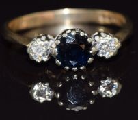 A 9ct gold ring set with a sapphire and diamonds, size N, 2.2g