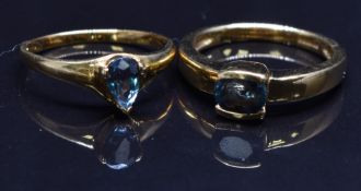 Two 18ct gold rings set with sapphires, size N, 7.4g