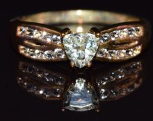 A 9k gold ring set with heliodor and topaz, size N, 2.4g