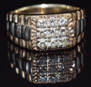 A 9ct bi-coloured gold signet ring set with nine diamonds, size Q, 6.5g