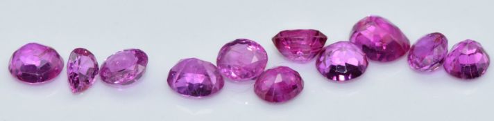 Eleven loose round cut natural unheated Burmese rubies, total carat weight approximately 3.97cts
