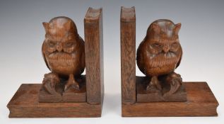 A pair of carved oak figural owl bookends, H19cm