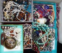 A collection of costume jewellery including Sphinx necklace, agate beads, amber bracelet, etc