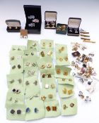 A collection of cufflinks and studs
