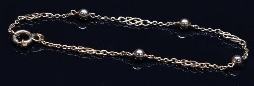 An 18ct gold bracelet with sphere decoration, 2.5g