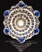 Austro-Hungarian silver pendant set with seed pearls and foiled blue paste in a tiered setting, 11.