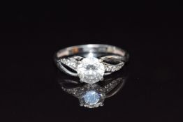A 9ct white gold ring set with cubic zirconia, size L, 1.7g