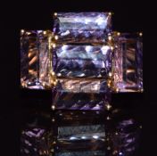A 9k gold ring set with amethysts, size N, 6.1g