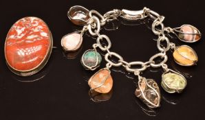 Victorian silver brooch set with blood/ lace agate and a silver charm bracelet with agate pebble